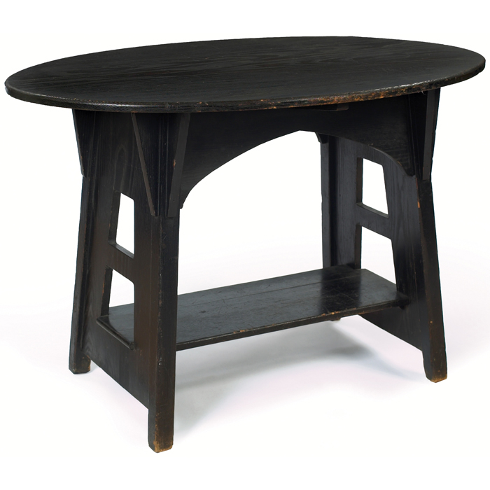 Appraisal: Limbert table in ash oval top over a lower shelf