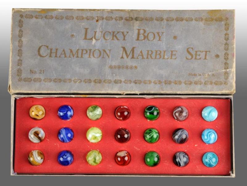 Appraisal: M Gropper Son Luck Box Champion Marbles Description Contains slipped