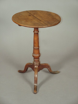 Appraisal: An oak circular tripod table mid th century upon a