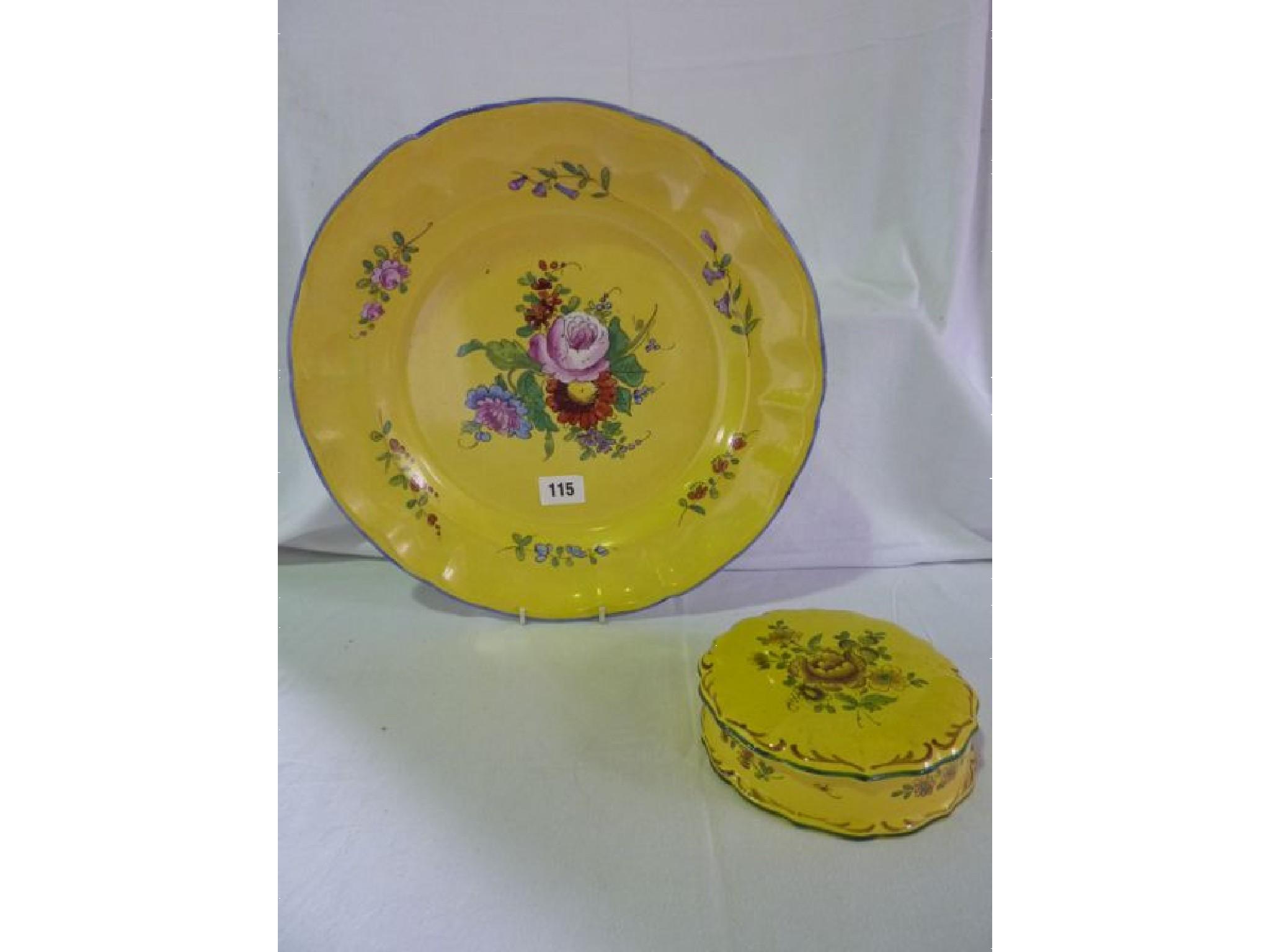 Appraisal: A continental lidded dish together with a wall plate both