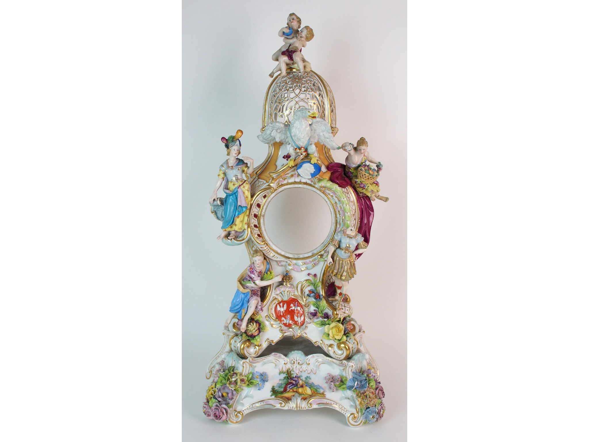 Appraisal: A German porcelain clockcase and standapplied in high relief with