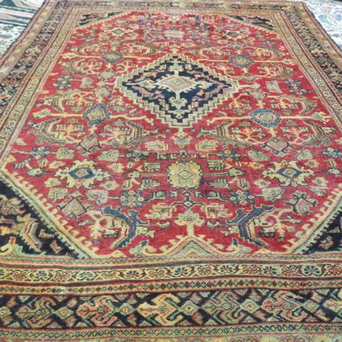 Appraisal: Mahal Persian Handmade Room Size Rug stylized floral deep earthtones