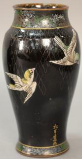 Appraisal: Earthenware Oriental vase background with heavy enameled painted birds signed