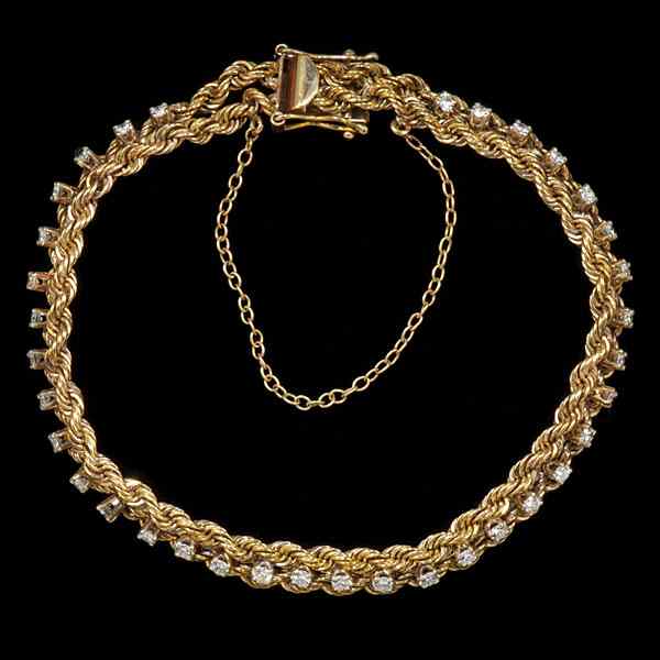 Appraisal: Gold and Diamond Bracelet A vintage K yellow gold mesh