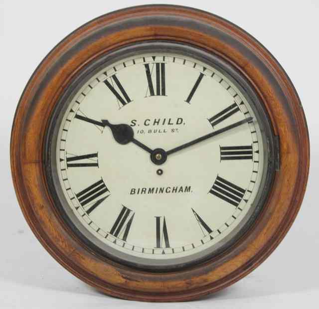 Appraisal: A Victorian eight-day kitchen dial in an oak case fitted