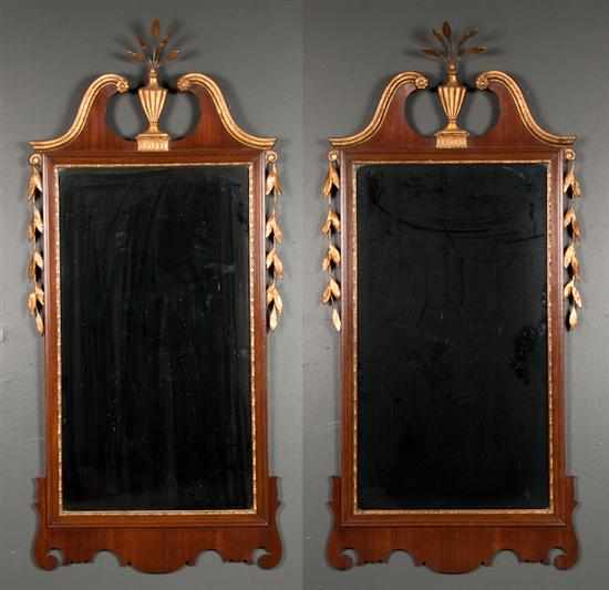 Appraisal: Pair of Federal style mahogany parcel giltwood mirrors in the