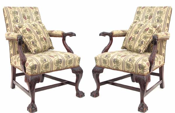 Appraisal: A pair of Renaissance style carved mahogany armchairs probably Baker