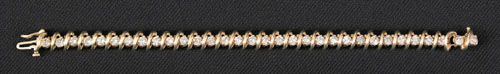 Appraisal: K yellow gold ladies diamond tennis bracelet containing thirty-two round