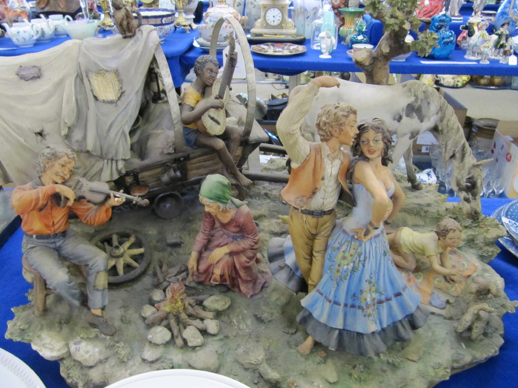 Appraisal: Large Capodimonte figure group of gypsies dancing by a fire