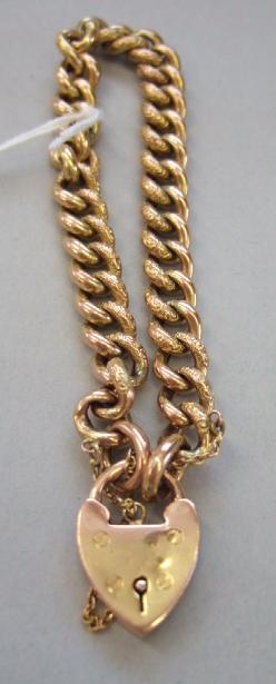 Appraisal: A Victorian gold decorated and plain curb link bracelet on