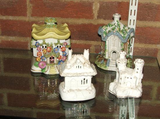 Appraisal: A COLLECTION OF THREE STAFFORDSHIRE POTTERY PASTILLE BURNERS in the