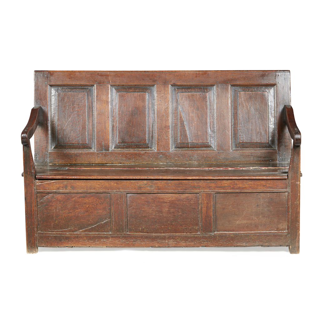 Appraisal: GEORGE II SMALL OAK SETTLE MID TH CENTURY the quadruple