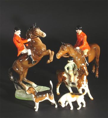 Appraisal: Huntsman on Rearing Horse' model no two other mounted Beswick