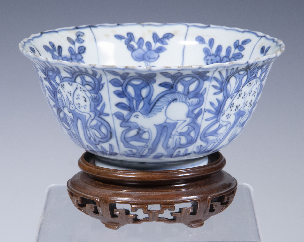 Appraisal: CHINESE PORCELAIN BOWL Ming Blue White Fluted Rim Footed Bowl