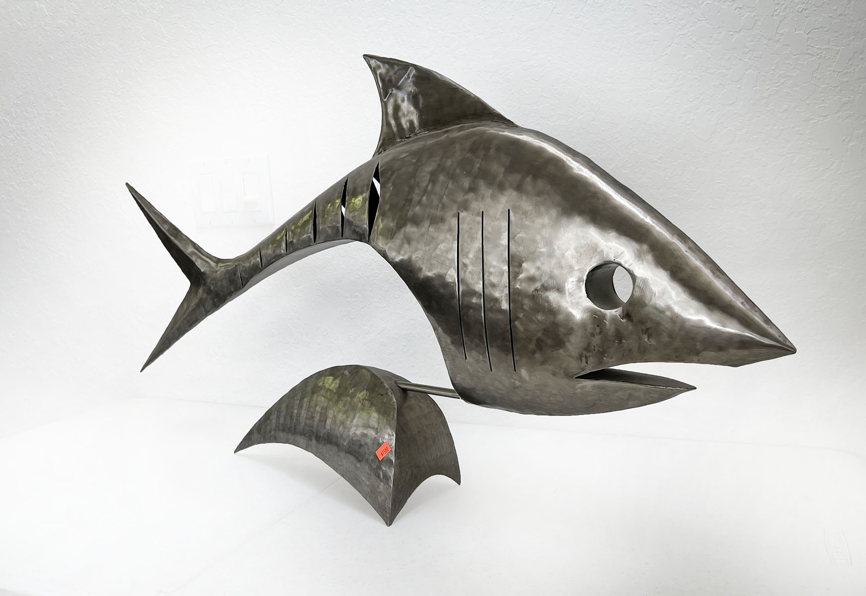 Appraisal: LARGE STAINLESS STEEL FOSSIL FISH BY STUART PETERMAN ''h X