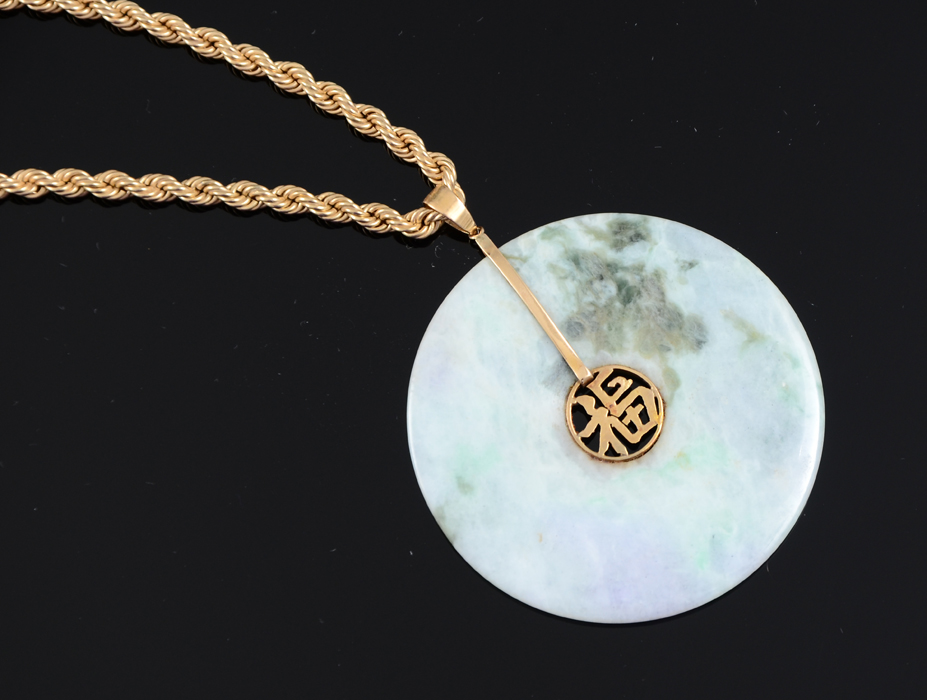 Appraisal: JADEITE JADE DISC PENDANT GOLD CHAIN k yellow gold mounted