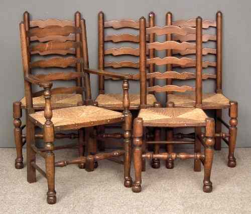 Appraisal: A set of five oak ladder back dining chairs including