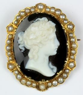 Appraisal: Onyx cameo pearl and k yellow gold pendant-brooch featuring one