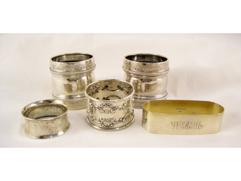 Appraisal: Sterling Napkin Rings Includes Two matching wide banded rings with