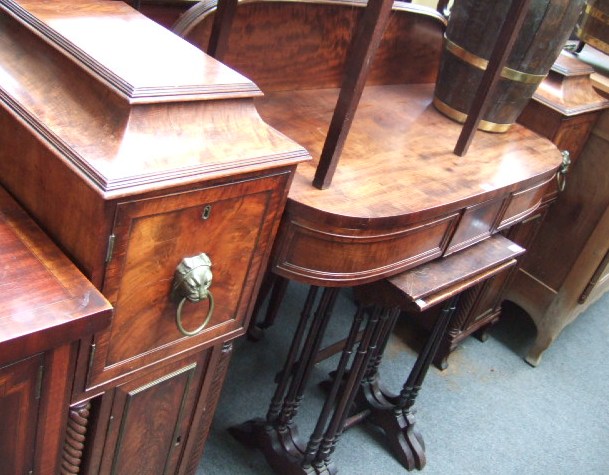 Appraisal: A Regency mahogany bowfront pedestal sideboard the bowfront centre section