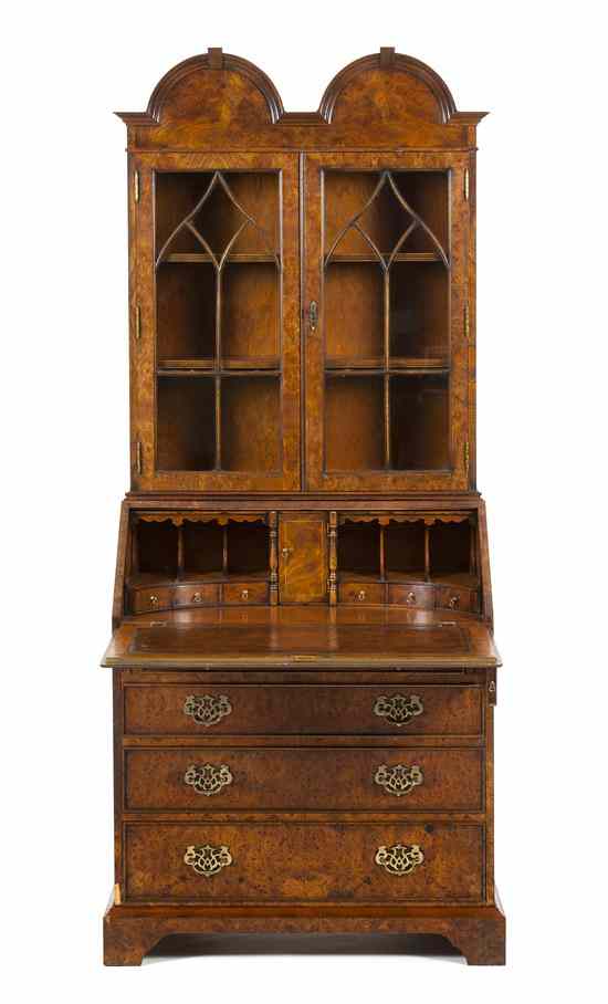 Appraisal: A Georgian Style Burl Walnut Secretaire having a double arched