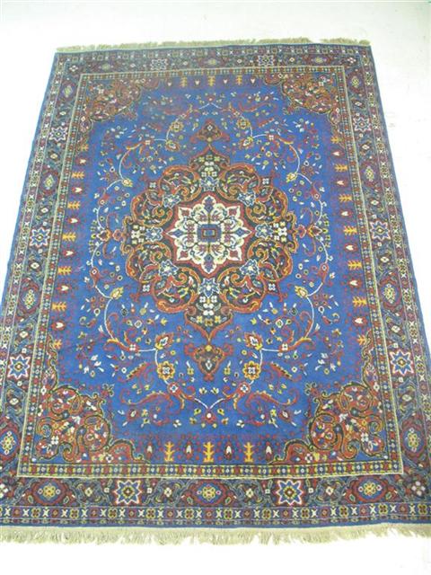 Appraisal: LARGE CHINESE STYLE RED AND BLUE GROUND RUG X in