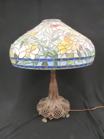 Appraisal: Bronze Leaded Glass Lamp floral shade high grade Tiffany reproduction