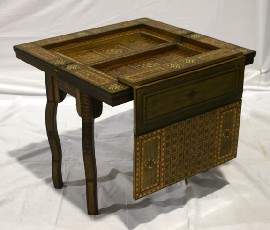 Appraisal: A Levantine games table featuring backgammon and baize inlaid in