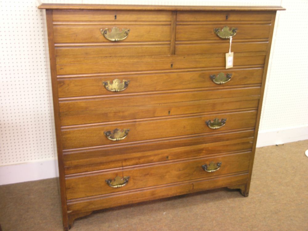 Appraisal: An Edwardian solid walnut chest two short and three long