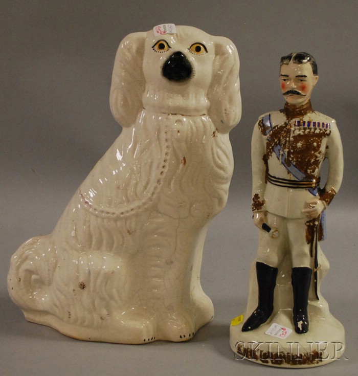 Appraisal: Large Staffordshire Seated Spaniel Figure and a Kitchener Figure ht