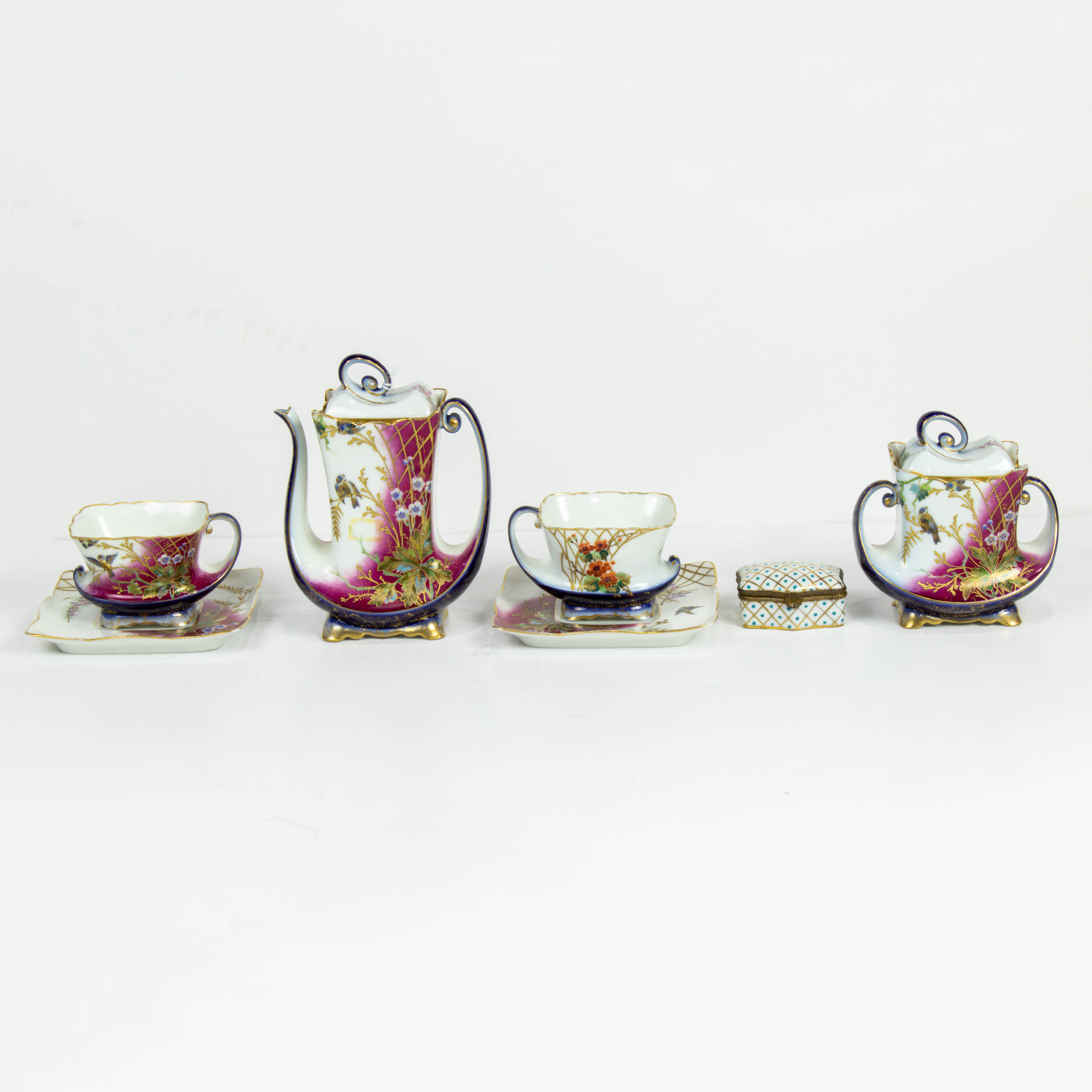 Appraisal: LOT OF JEAN POUYAT LIMOGES PORCELAIN TETE-A-TETE IN A JAPONESQUE