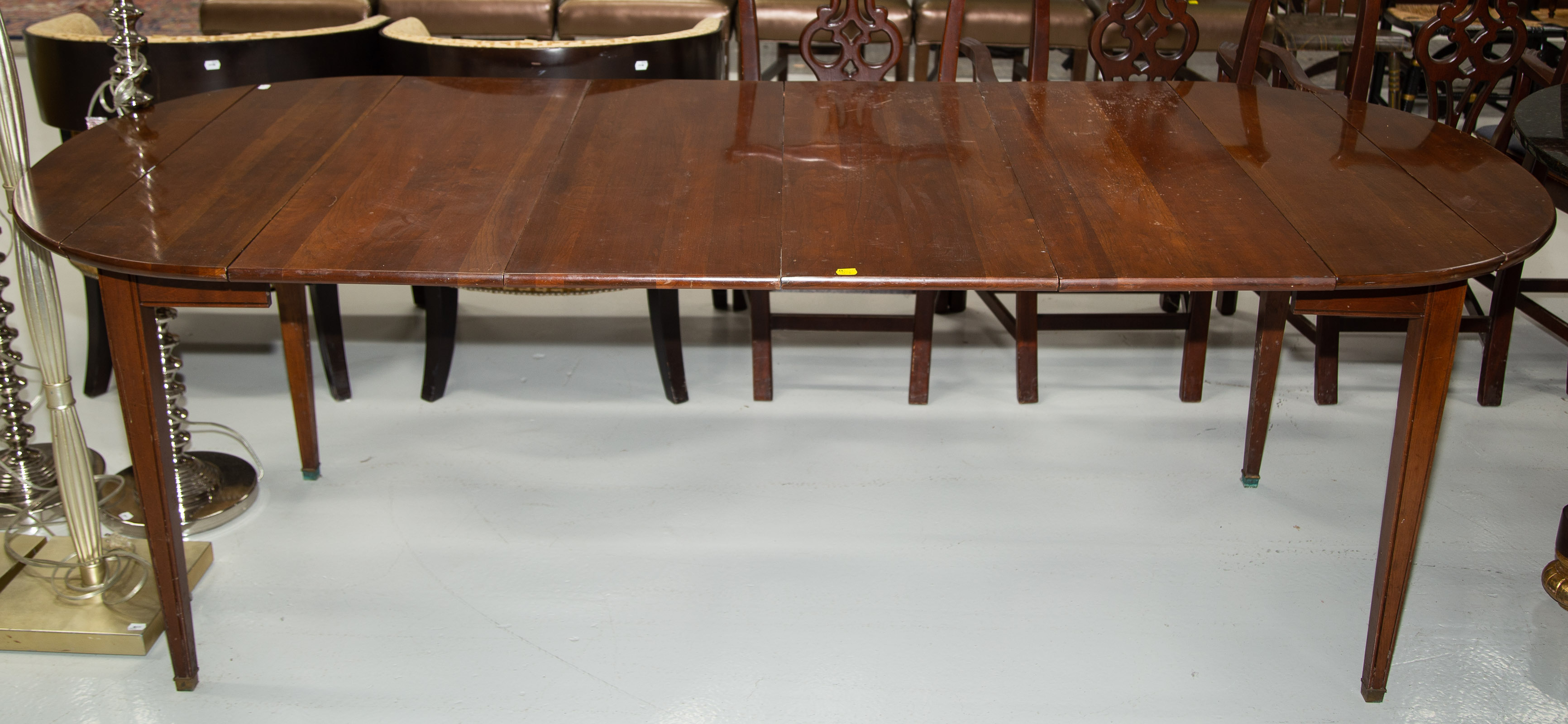 Appraisal: REGENCY STYLE CHERRY DINING ROOM TABLE With two extension leaves