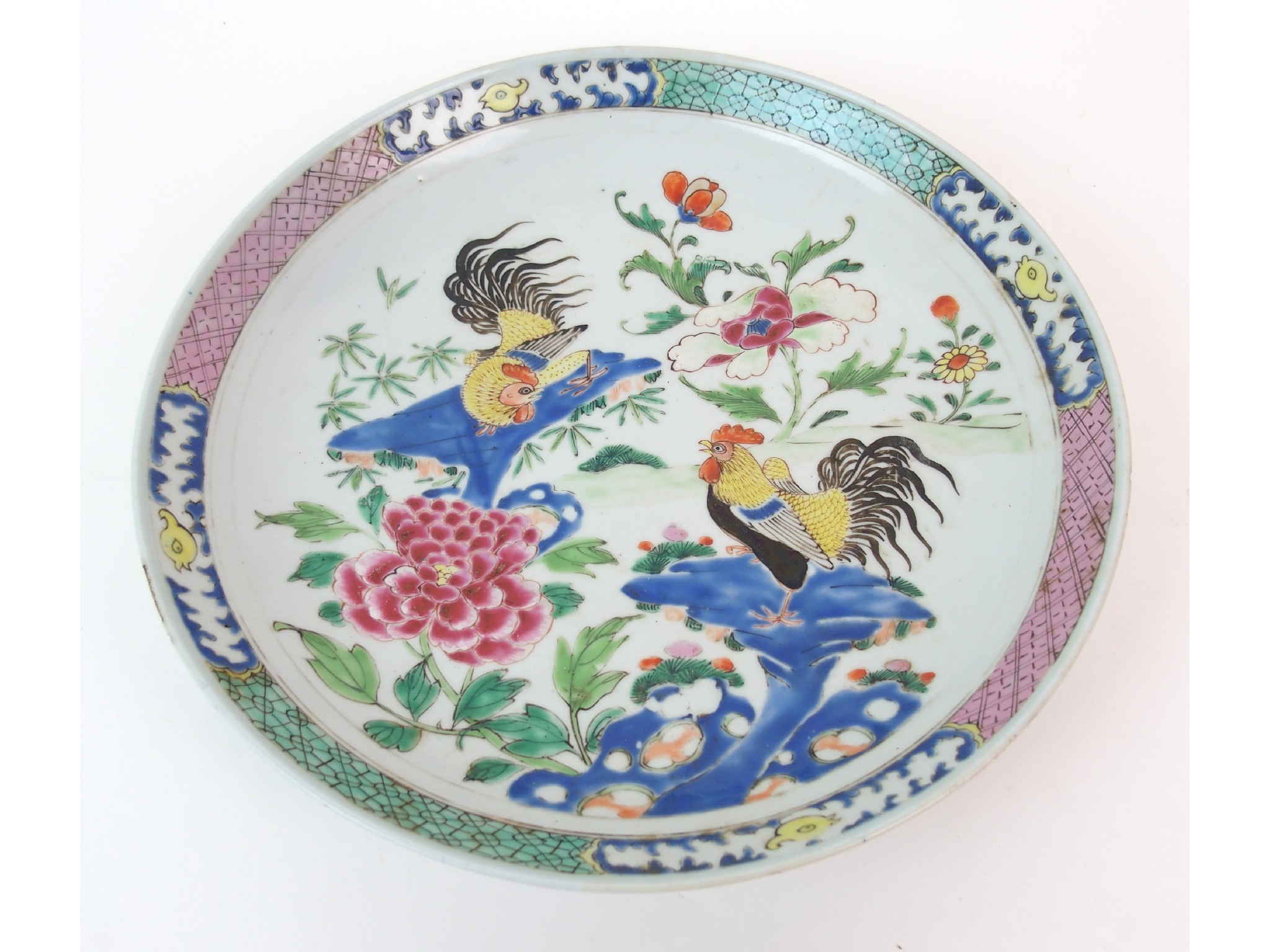 Appraisal: A Chinese famille rose dishpainted with two cockerels amongst peonies