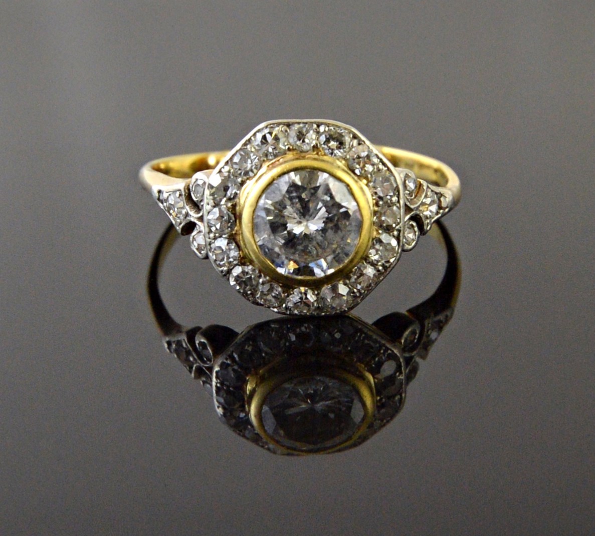 Appraisal: A gold and diamond set cluster ring collet set with