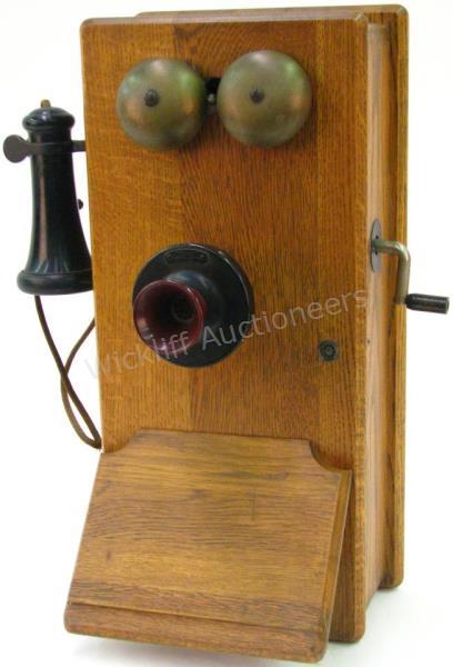 Appraisal: An antique Western Electric wall telephone oak case x x