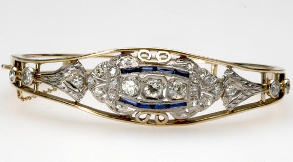 Appraisal: GOLD AND PLATINUM DIAMOND AND SAPPHIRE BRACELET k yg with