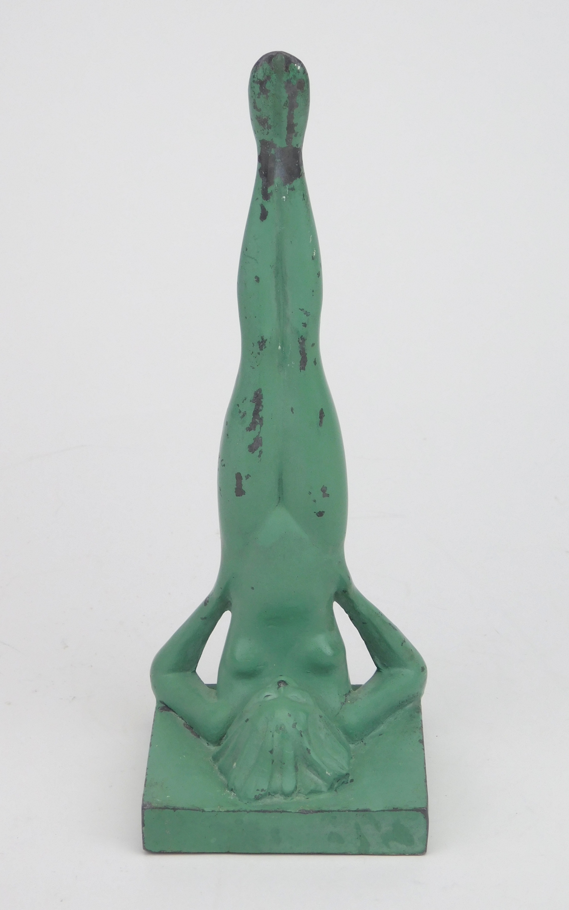 Appraisal: Applied Arts 'Acrobat' bookend ca - 's in legs up