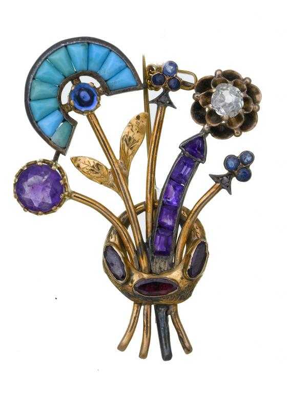 Appraisal: A DIAMOND SAPPHIRE TURQUOISE AND AMETHYST SPRAY BROOCH in gold