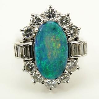 Appraisal: Oval Cabochon Black Opal Approx Carat Diamond and Platinum Ring