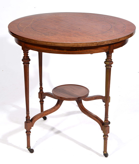 Appraisal: AN EDWARDIAN SATINWOOD CIRCULAR OCCASIONAL TABLE with marquetry foliate swag