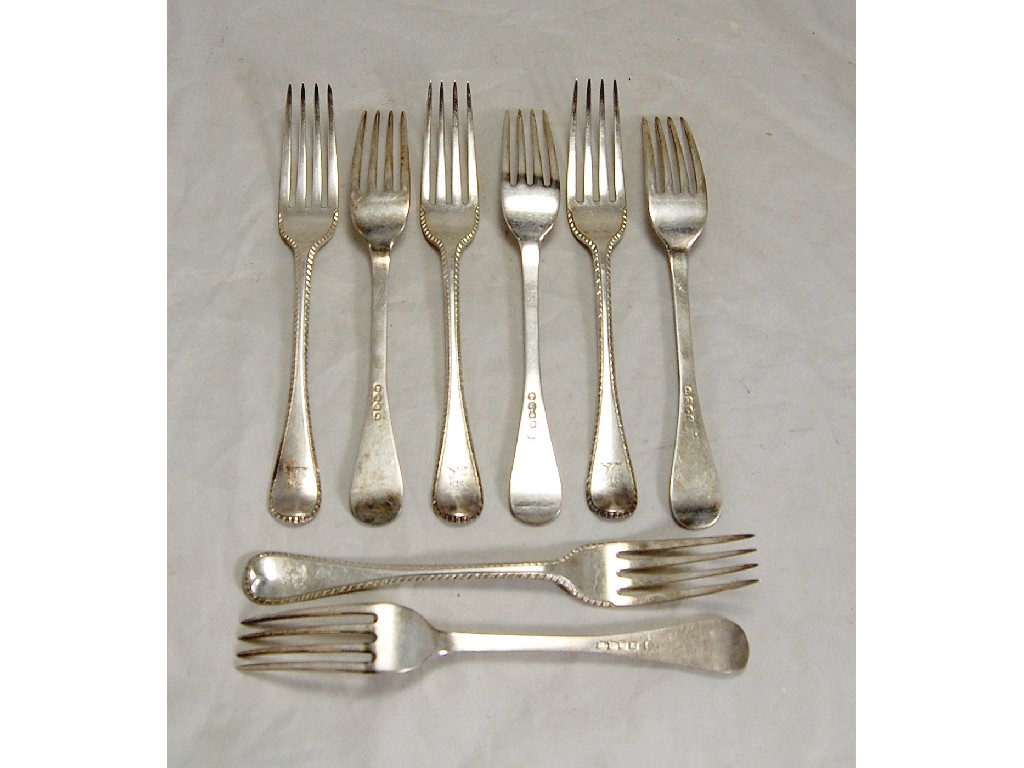 Appraisal: Georgian eight silver Hanovarian thread table forks London approx ozs