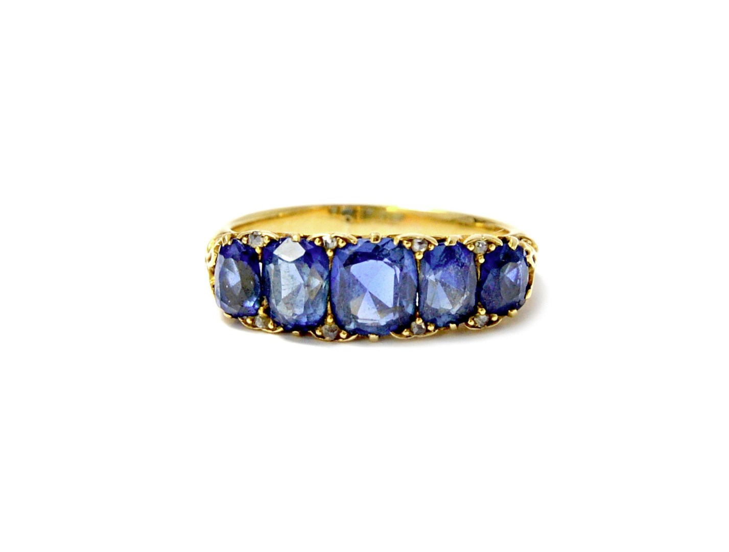 Appraisal: A gold and sapphire set five stone ring mounted with