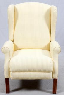 Appraisal: YELLOW UPHOLSTERED AND MAHOGANY WING BACK ARM CHAIR H ''