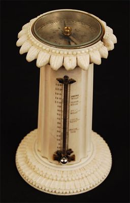 Appraisal: A late Victorian turned and carved ivory desk thermometer with