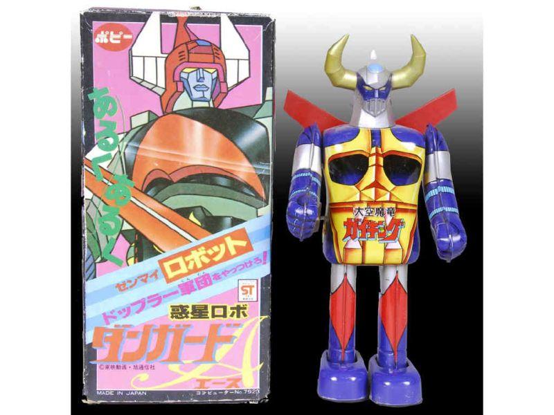 Appraisal: Japanese Tin Wind-Up Grandizer Superhero Toy with Description - ''