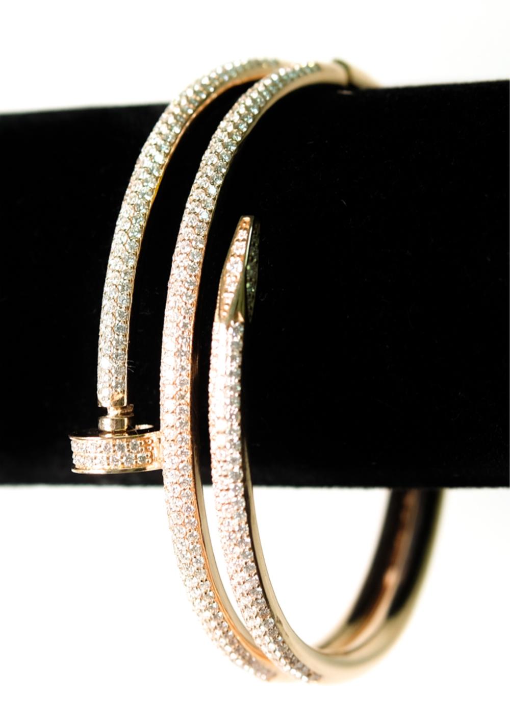 Appraisal: K RG BENT NAIL HEAD DIAMOND BRACELETStyle of Cartier K