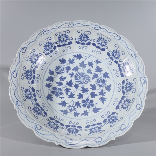 Appraisal: Chinese blue and white porcelain charger with flowers and concentric