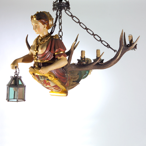 Appraisal: Large Bavarian hardwood and antlers figural chandelier carved and painted