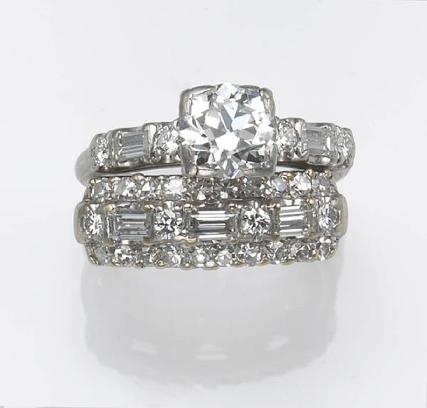 Appraisal: A diamond platinum and palladium wedding set center diamond weighing