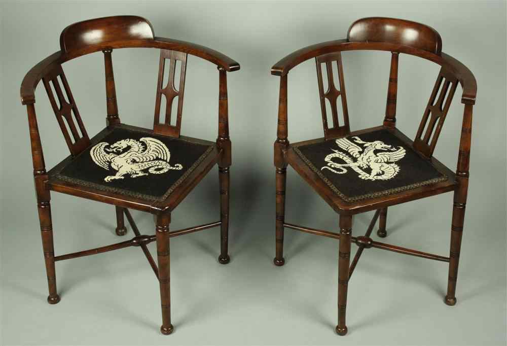 Appraisal: PAIR OF EDWARDIAN MAHOGANY CORNER CHAIRS WITH NEEDLEPOINT SEATS each